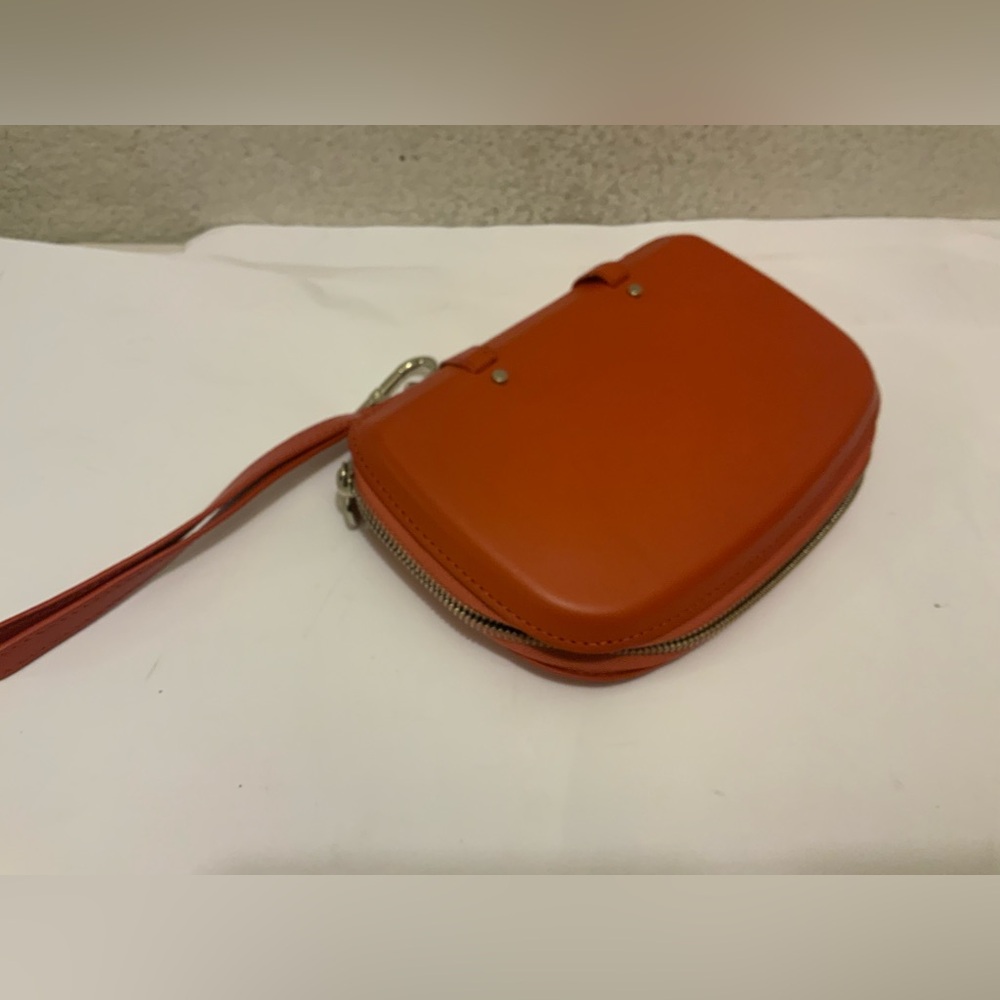New Perrin mini orange metallic leather clutch/wristlet NWOT